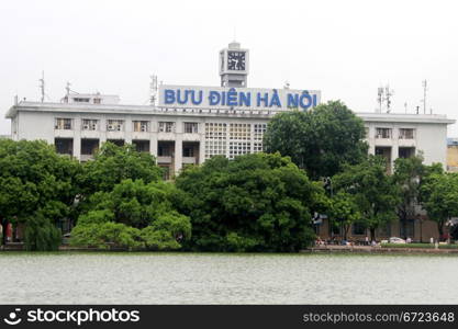Goverment building on the bank of lake Hoan Kiem in Hanoi, Vietnam