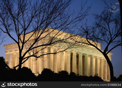 Government building lit up at night, Washington DC, USA