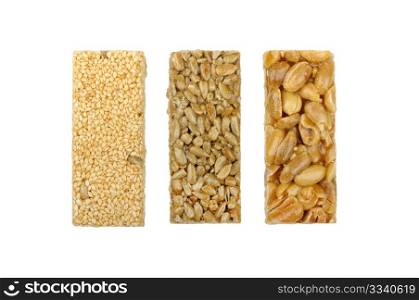 gozinaki of sunflower seeds sesame seeds and peanuts isolated on a white background