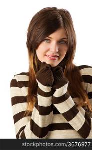 graceful and sweet brunette looking in camera and wearing a white and brown sweater