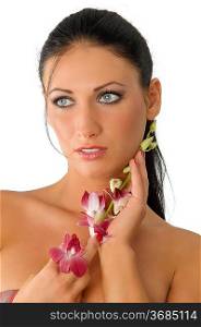 graceful brunette with fair blue eyes and some red flowers