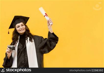 graduate student with camera diploma