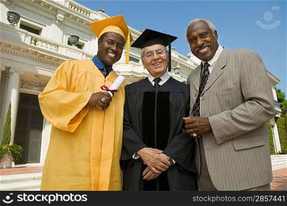 Graduate with Father and Administrator