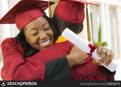 Graduates Hugging