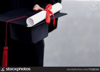 graduation,close up student holding hats and tassel red in hand during commencement success graduates of the university,Concept education congratulation.Graduation Ceremony.