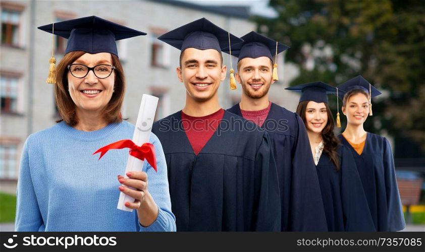 graduation, education and old age concept - happy senior graduate student woman in mortar board with diploma next to young people over university campus background. happy senior graduate student woman with diploma