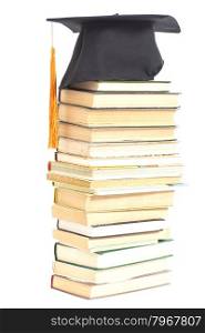 Graduation Hat with books isolated on white