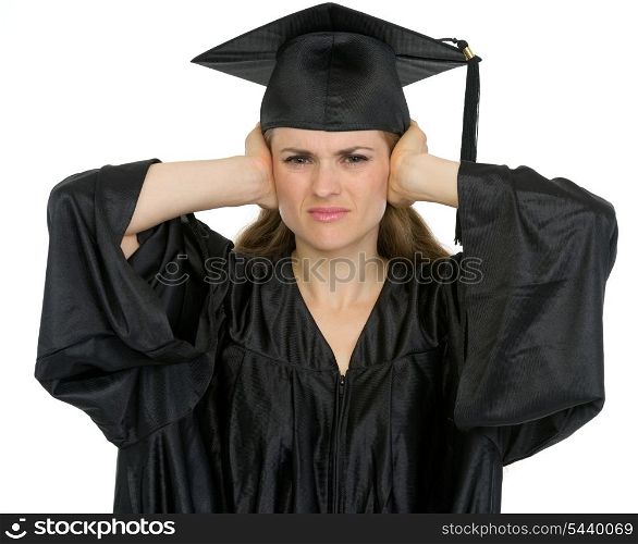 Graduation student girl making hear no evil gesture