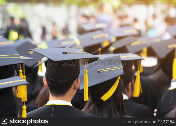 graduation,Student hold hats in hand during commencement success graduates of the university,Concept education congratulation.Graduation Ceremony,Congratulated the graduates in University.