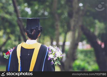 graduation,Student hold hats in hand during commencement success graduates of the university,Concept education congratulation.Graduation Ceremony,Congratulated the graduates in University.