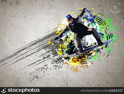 Graffiti image. Graffiti style image of snowboarder against grunge background