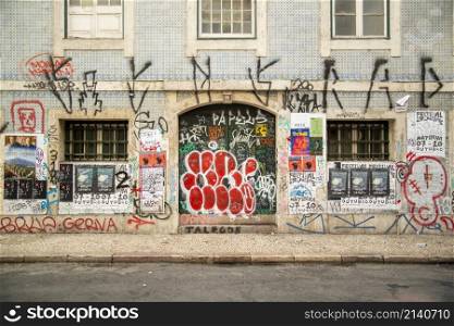 Graffiti on a Building in Baixa in the City of Lisbon in Portugal. Portugal, Lisbon, October, 2021
