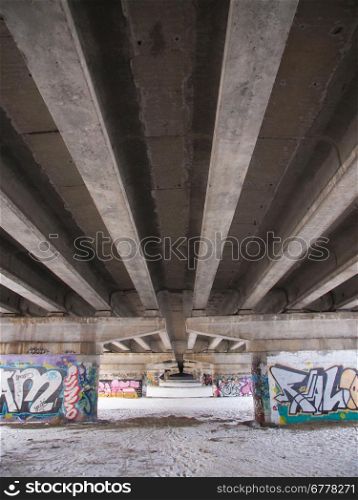 Graffiti under the bridge of the highway