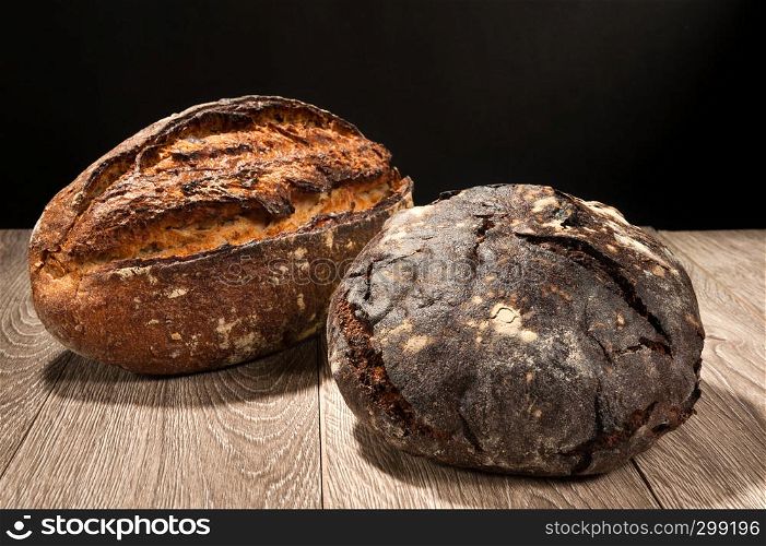 grain bread and buckwheat bread on dark background