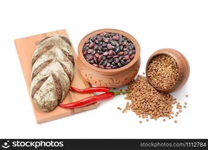 Grain bread , kidney bean, uncooked lentils isolated on white background. Organic and healthy food.
