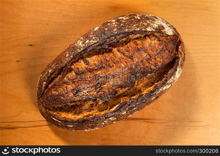 grain bread on wooden background