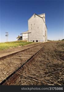 Grain Elevator and railroad tracks.