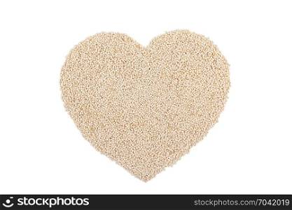 grain of quinoa in heart shape isolated on background