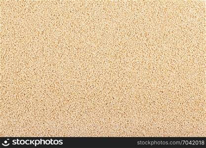 grain of quinoa on background