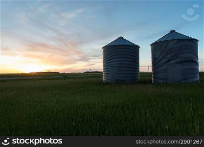 Grain silos in a prairie field, Manitoba, Canada