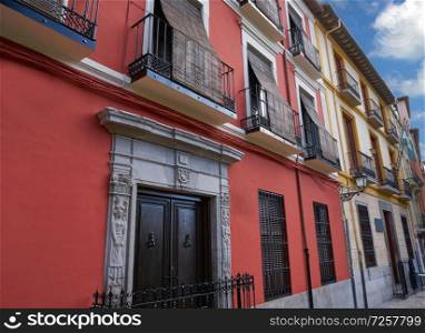 Granada colorful facades in Santa Ana square at Andalusia Spain