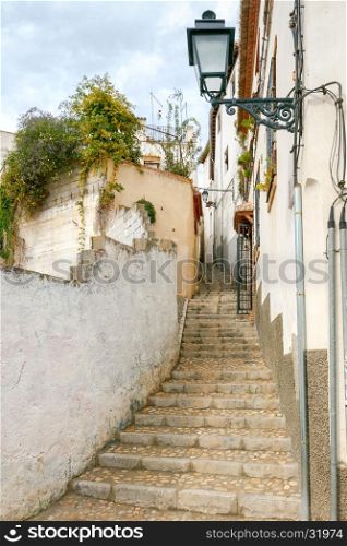 Granada. District Albayzin.. Old medieval street in the Arab quarter of Albayzin. Granada. Spain. Andalusia.
