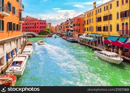 Grand Canal, bridges and colorful houses of Venice, Italy.. Grand Canal, bridges and colorful houses of Venice, Italy