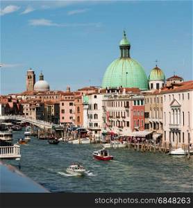 Grand Canal, Dome of San Simeon Piccolo&rsquo;s Church and Ponte degli Scalzi in Venice - Italy
