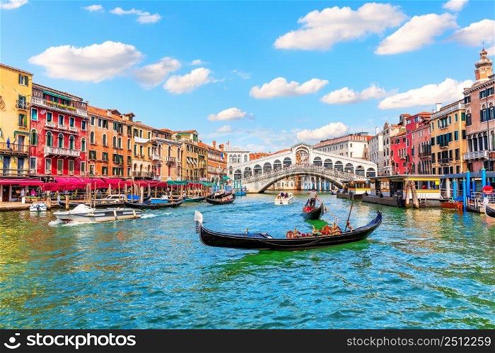 Grand Canal of Venice, view of the Rialto bridge in the Lagoon, Italy.