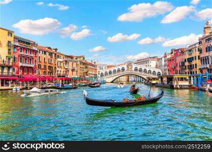 Grand Canal of Venice, view of the Rialto bridge in the Lagoon, Italy.