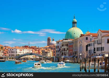 Grand Canal, Ponte degli Scalzi and the Vaporetto stop Ferrovia in summer sunny day near church San Simeone Piccolo, Venice, Italy.