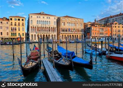 Grand Canal with boats and gondolas on sunset, Venice, Italy. Grand Canal in Venice, Italy