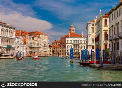 Grand Canal with boats and the Vaporetto stop in summer sunny day, Venice, Italy
