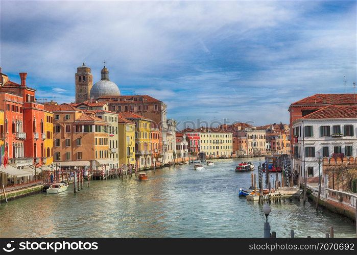 Grand Canal with gondolas and boats in Venice