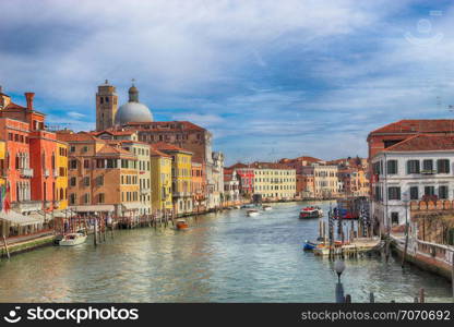 Grand Canal with gondolas and boats in Venice