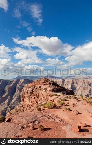 Grand canyon in sunny day with blue sky and clouds