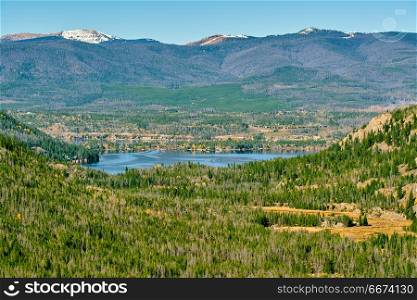 Grand Lake, Rocky Mountains, Colorado, USA. . Grand Lake with rocks and mountains around at autumn. Rocky Mountain National Park in Colorado, USA.