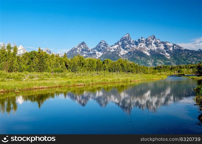 Grand Teton Mountains from Schwabacher&rsquo;s Landing on the Snake River at morning. Grand Teton National Park, Wyoming, USA.