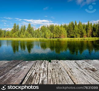 Grand Teton Mountains from Schwabacher&rsquo;s Landing on the Snake River at morning. Grand Teton National Park, Wyoming, USA.