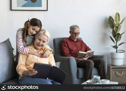 granddaughter hugging woman medium shot