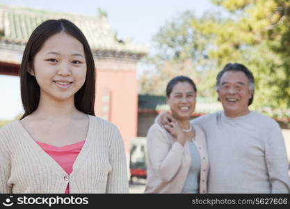 Granddaughter with grandparents, portrait