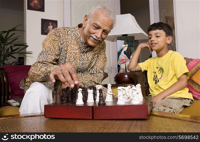 Grandfather playing with grandson