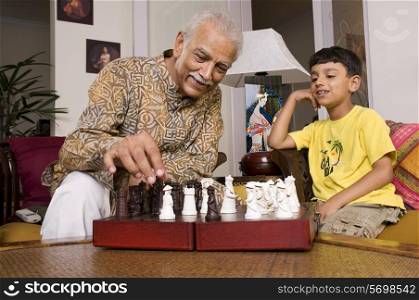 Grandfather playing with grandson
