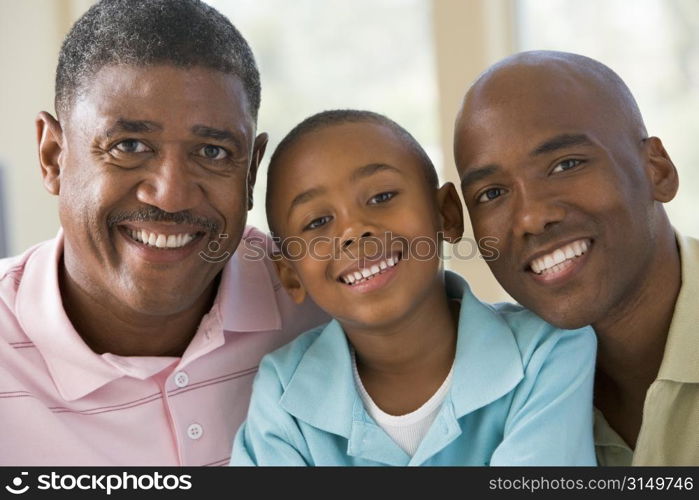 Grandfather with adult son and grandchild