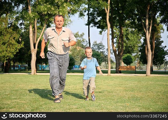 Grandfather with grandson run