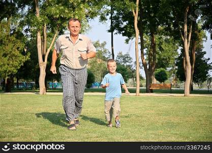 Grandfather with grandson run