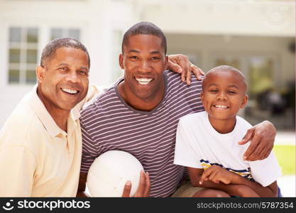 Grandfather With Son And Grandson Playing Volleyball