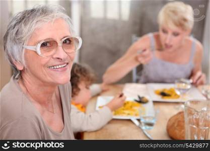 Grandma joins an informal family supper