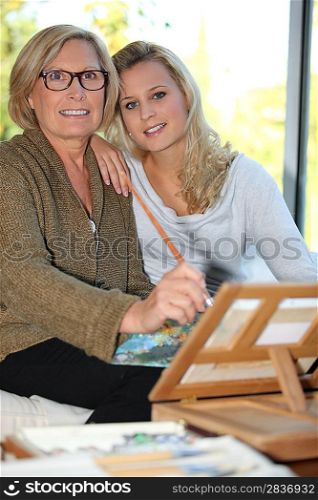 grandmother and granddaughter together at home