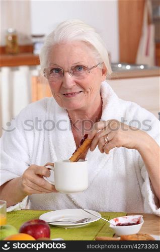 grandmother having breakfast